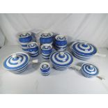 A quantity of TG Green Cornish ware blue and white banded ceramics to include lidded jars and