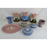 Three Wade NatWest piggy banks and a quantity of Wedgwood Jasperware to include coral pink tray,