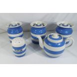 Five pieces of T G Green blue and white Cornish ware to include three large lidded jars,