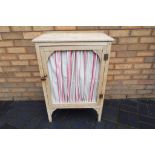 An antique pine larder cupboard with a lead fitted base and one shelf approx 90cms x 60cms x 36cms