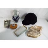 A riding hat by Charles Owen size 54, a stoneware water jug, a stone ashtray,