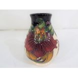 A Moorcroft Anna Lily vase, approx 7.5 cm (h) .