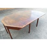 An antique Victorian mahogany extending dining table plus extra leaf approx 75cm x 140cm x 187cm