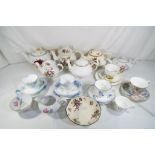 A mixed lot of ceramics to include teapots, trios and similar to include Sadler, Minton,Crown Ducal,