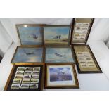 A collection of pictures to include four airplane prints,