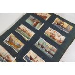 A period Wills Cigarette Card Album containing a good collection of approximately 200 pictorial