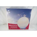 An Innosol Rondo Bright Light therapy light,