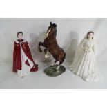 A lot to include a Beswick ceramic figurine depicting a rearing horse,