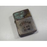 Vietnam / American war interest - a Zippo lighter inscribed when the power of love is as strong as
