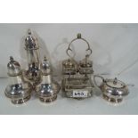 A quantity of good quality silver plated items to include a cruet set, a sugar shaker and similar.