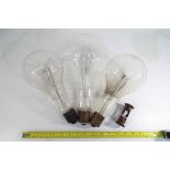 Three large early period Mazda electric light bulbs,