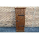 A good quality solid wooden cabinet with single door opening to reveal three shelves,