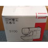 A Janome 5100 sewing machine contained in original box appears unused