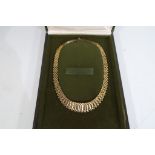 A lady's 9 ct gold evening necklace contained in original case approximate weight 25.
