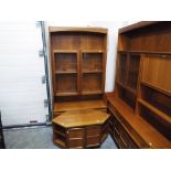 A teak glass fronted wall unit by Parker Knoll approx 194cms x 102cms x 46cms also included in the