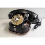 An original black metal telephone handset marked Bell Telephone with TTR logo and gilt decoration -