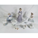 Nao - a quantity of Nao ceramic figurines to include swans and lady figurines (9)