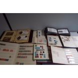 Philately - a box containing eleven stamp albums comprising miscellaneous worldwide stamps and