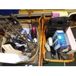 Two boxes containing a quantity of household items, binoculars, vintage cameras, vintage clocks,