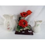 Two boxed Belleek vases the largest approx 21cms (h) and a Monte Rosa Capodimonte flower (3)
