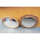 Two gild framed bevelled edged wall mirrors,