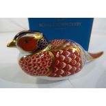 A Royal Crown Derby pheasant with gold stopper.