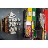 Lot to include a quantity of board games, jigsaw, shooting game,