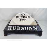 A cast Hudson Soap dog bowl.