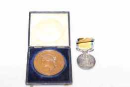 Victoria Baltic medal, 1854-1855, not named; and a bronzed medallion for gallantry in sailing life,