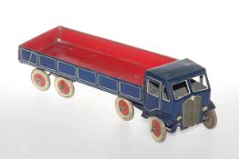 Vintage tin plate model of a truck with 'Dunlop Fort' tyres and wind-up mechanism, 43.