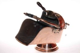 Highly polished copper coal bucket with turned wood handles and shovel
