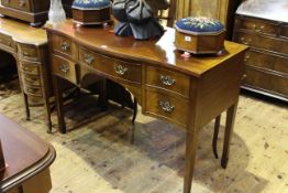 Edwardian inlaid mahogany five drawer serpentine front sideboard on square tapering legs to spade