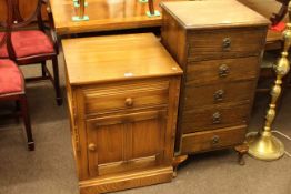 Ercol pedestal cupboard and slim oak five drawer chest (2)