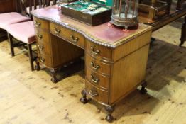 Mahogany Chippendale style inverted breakfront nine drawer twin pedestal desk on ball and claw legs,