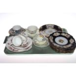 Limoges tazza and six similar plates,