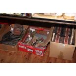 Collection of model railway equipment including track, buildings,