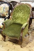 Victorian carved mahogany framed armchair with serpentine front seat on cabriole legs