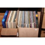 Two boxes of LP records and two boxed sets