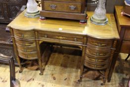 19th Century inlaid mahogany inverted breakfront nine drawer writing desk,