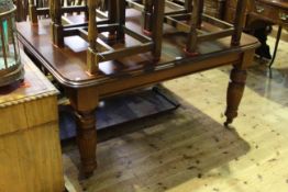 Victorian mahogany extending dining table and two leaves on turned fluted legs