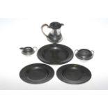 Pewter three piece tea set and two pairs of London pewter plates