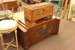 Oriental carved camphorwood trunk and smaller carved camphorwood trunk