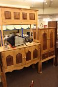 Three oak and walnut panelled cabinets