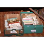 Two boxes of cigarette and tea cards,