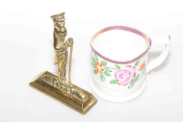19th Century pink lustre tankard and a brass door stop (2)