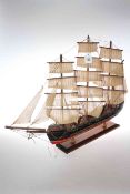 Wooden model of a galleon on base