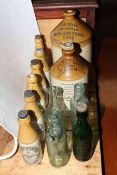 Collection of stoneware and glassware advertising items including flagon for John Noble,