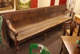 Victorian open arm bench on turned legs,