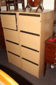 Two ash finish four drawer filing cabinets
