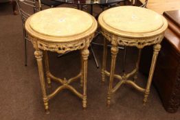 Pair circular marble topped and gilt lamp tables